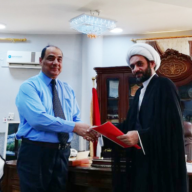Signing a joint working paper with the College of Islamic Sciences / University of Babylon